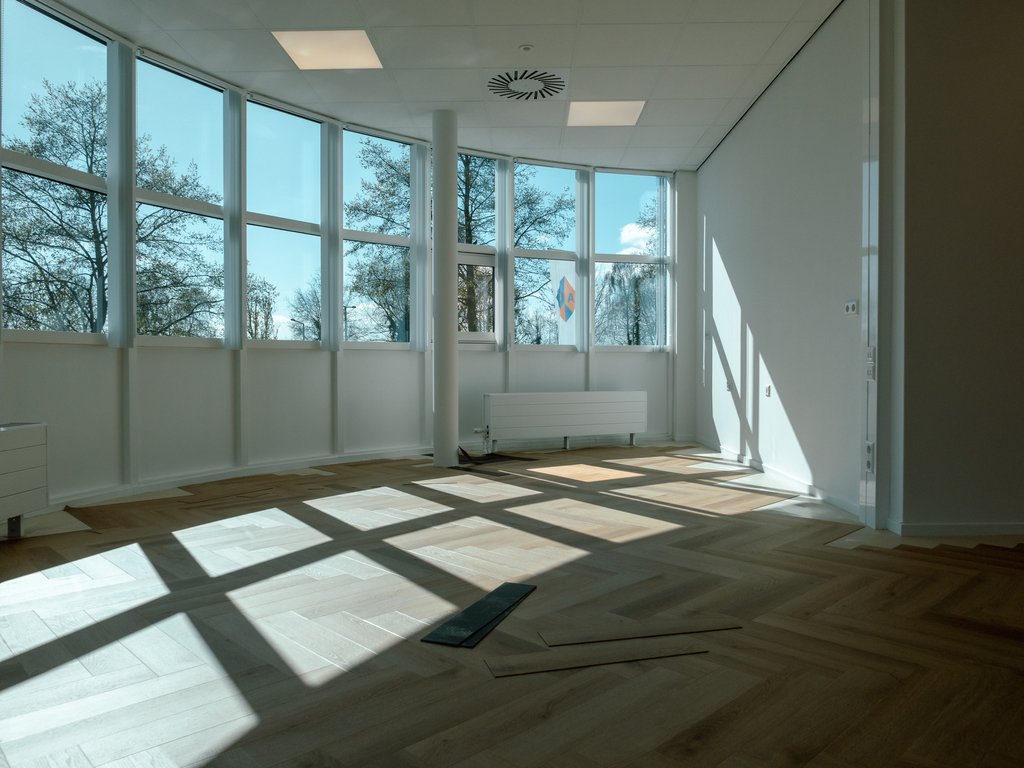 Herringbone parquet flooring installed at Luna, Amersfoort