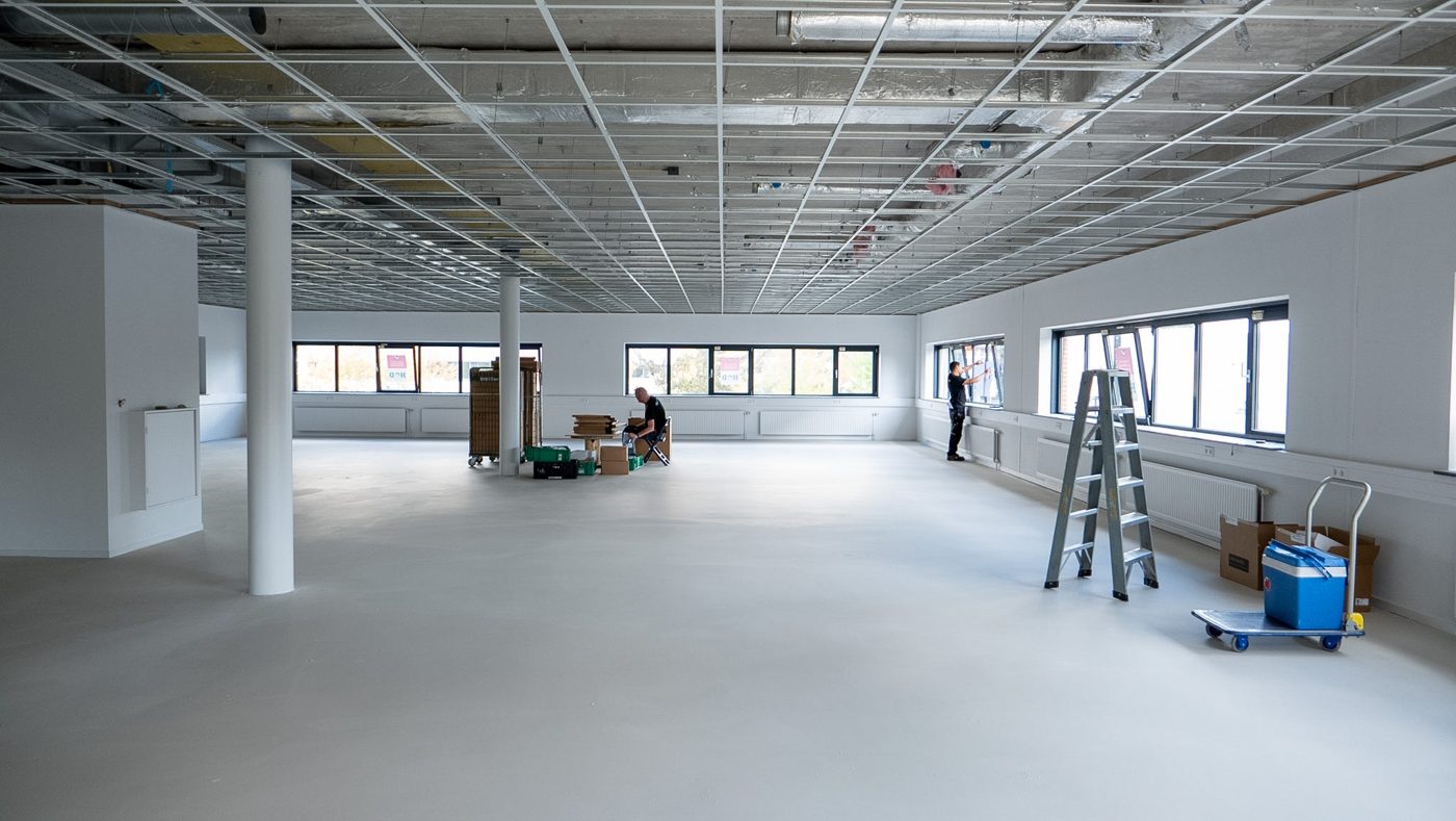Finished walls and windows on the first floor at Pulse
