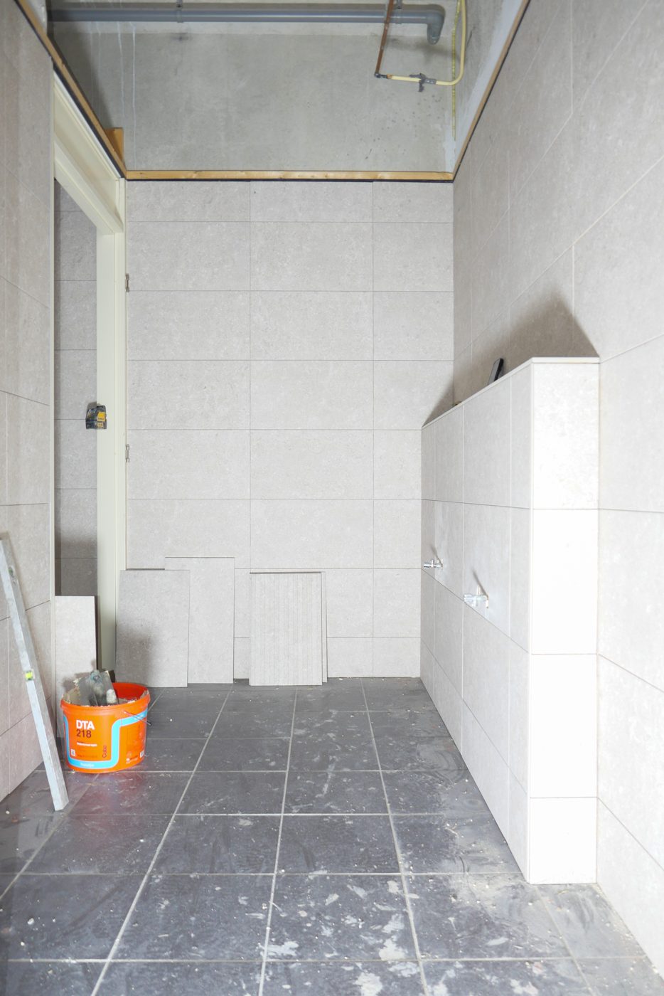Finished tiled toilet room at Pulse