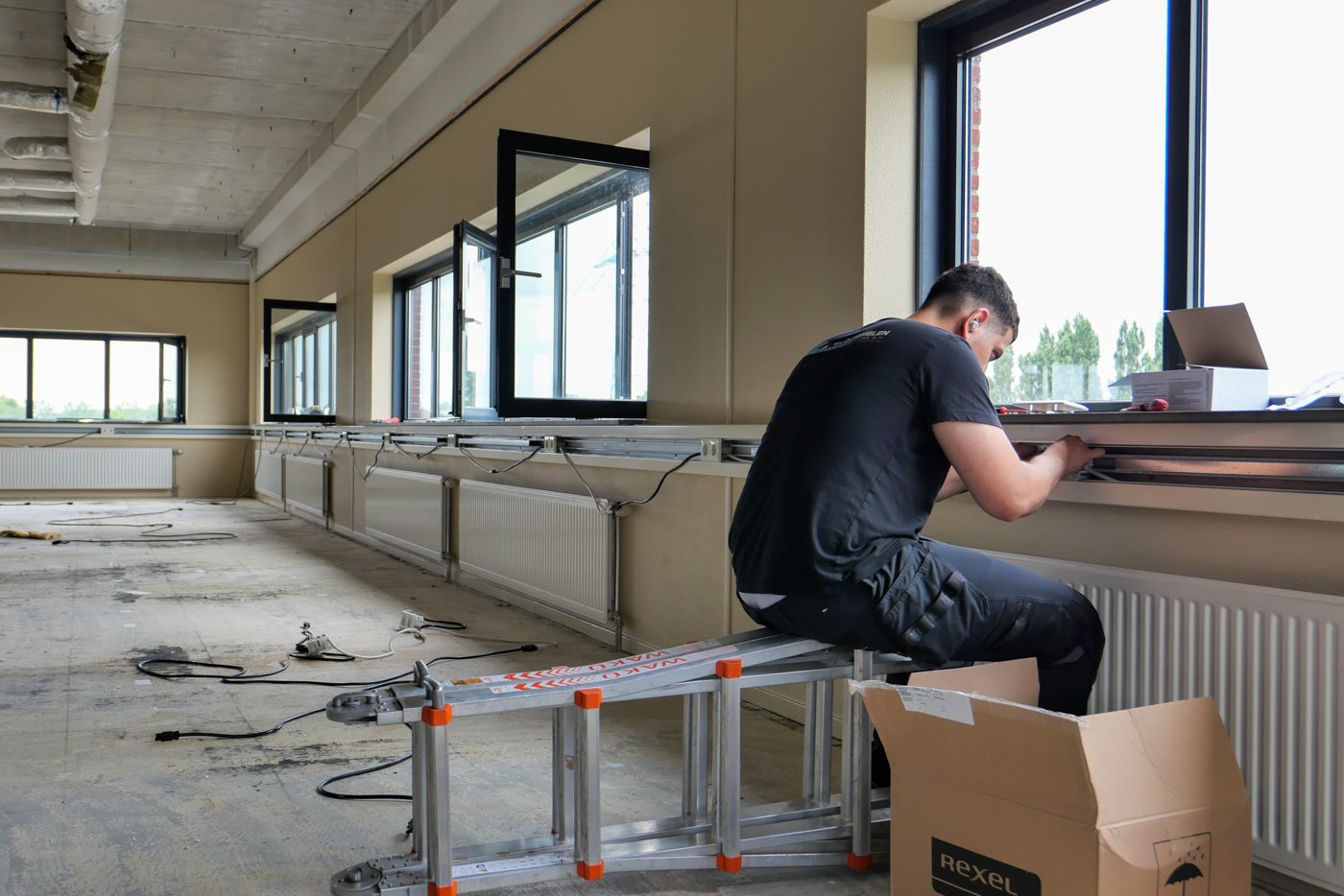Fitting window and frame hardware at Pulse